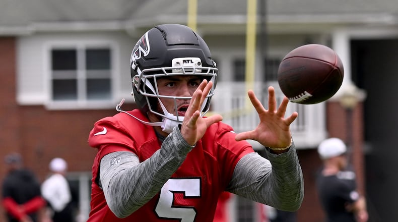 Atlanta Falcons wide receiver Drake London (5) runs a drill during an OTA workout at Atlanta Falcons Training Facility on Wednesday, May 27, 2026, in Flowery Branch. (Hyosub Shin/AJC)