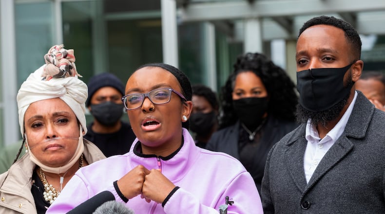 Monet Carter-Mixon, sister of Manny Ellis, speaks at a press conference in front of the Pierce County Superior Court Thursday, June 4, 2020 regarding the killing of her brother by Tacoma police. At left is Manny's mother Marcia Carter-Patterson and at right is his brother Matthew Ellis. Tacoma police's restraint of Manuel Ellis caused his death the medical examiner has reported. The community has been protesting the March 3, 2020, for the past week.