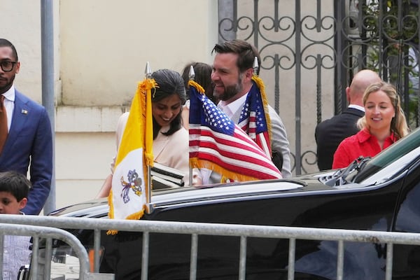 U.S. Vice President JD Vance, centre, his wife Usha and their children arrive at the Basilica of Saint Paul Outside The Walls in Rome, Sunday, April 20, 2025. (AP Photo/Alessandra Tarantino)