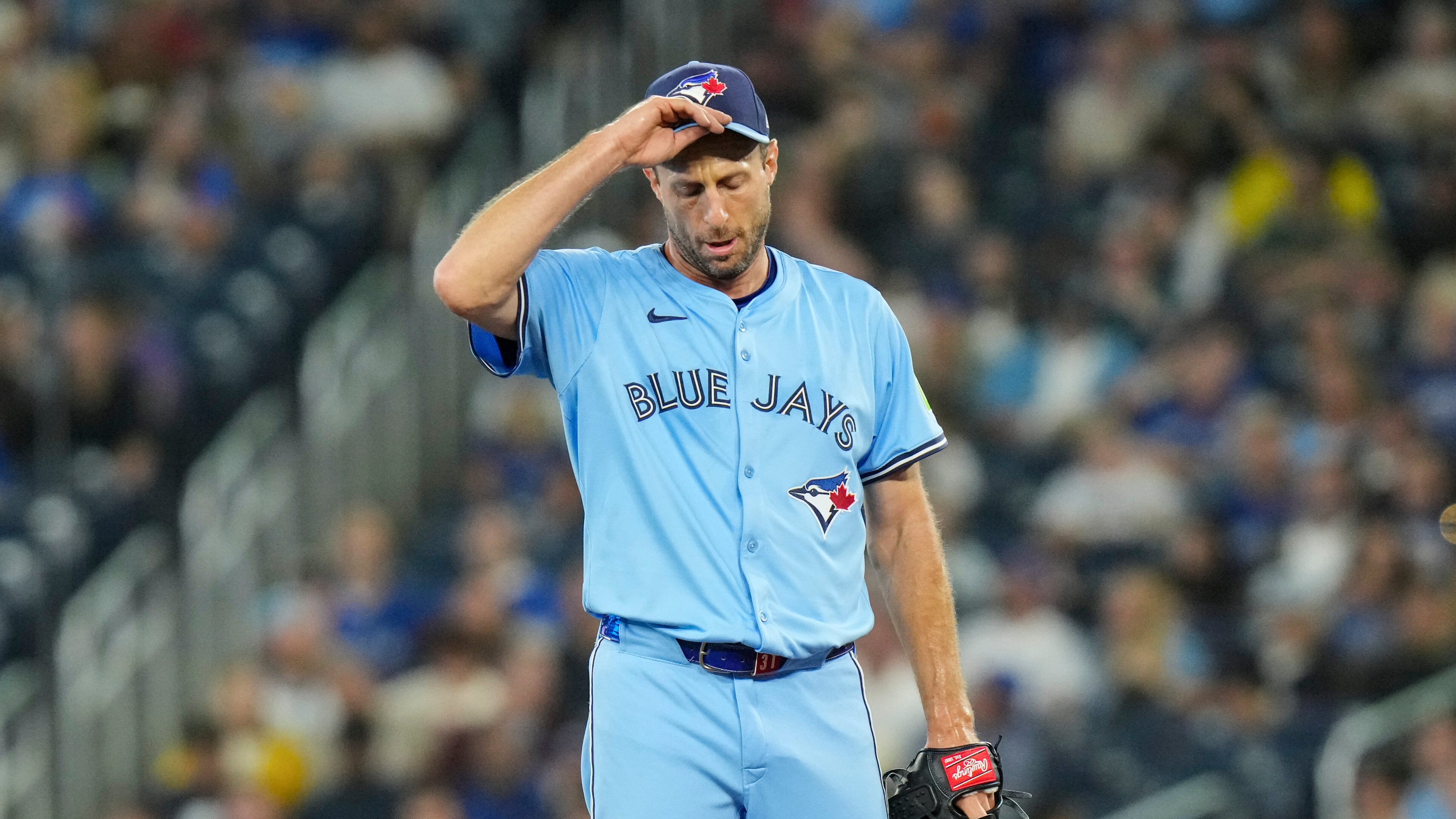 Toronto Blue Jays pitcher Max Scherzer (31) reacts as he works against the Boston Red Sox during first inning MLB baseball action in Toronto on Wednesday, Sept. 24, 2025. (Chris Young/The Canadian Press via AP)
