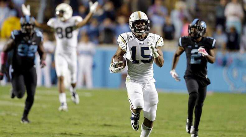 Georgia Tech's DeAndre Smelter (15) runs the ball for a touchdown to give the Yellow Jackets a lead late against North Carolina. North Carolina rallied back for the 48-43 win.