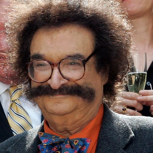 FILE - In this May 31, 2006 file photo, film critic Gene Shalit is seen during a toast with "Today" show cast and crew at the end of Katie Couric's final show, in New York. (AP Photo/Richard Drew, File)