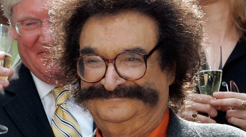 FILE - In this May 31, 2006 file photo, film critic Gene Shalit is seen during a toast with "Today" show cast and crew at the end of Katie Couric's final show, in New York. (AP Photo/Richard Drew, File)