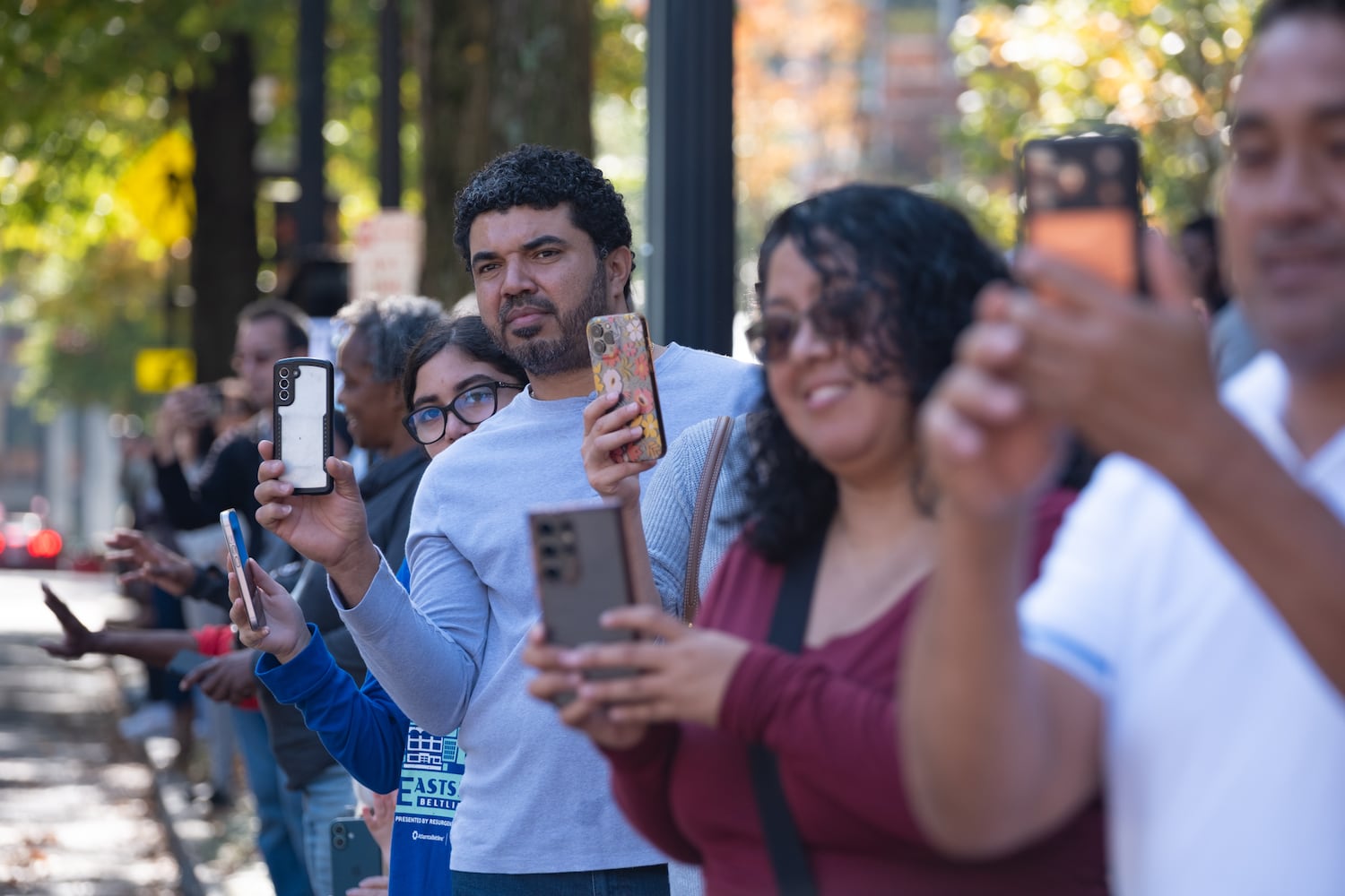 People watch the Georgia Veterans Day Parade in Midtown Atlanta on Saturday, Nov. 8, 2025.   Ben Gray for the Atlanta Journal-Constitution