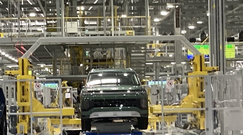 A nearly finished Kia Sportage hybrid nears the end of the assembly process at the Hyundai Metaplant near Savannah. The automotive industry supports tens of thousands of jobs and contributes more than a billion dollars to the state’s economy, guest columnist Jennifer Safavian writes. (Adam Van Brimmer/AJC)