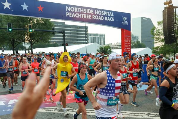 One runner took a decidedly bananas approach to race-day fashion during the 57th running of the Peachtree Road Race. Sorry, I had to. (Arvin Temkar/AJC)