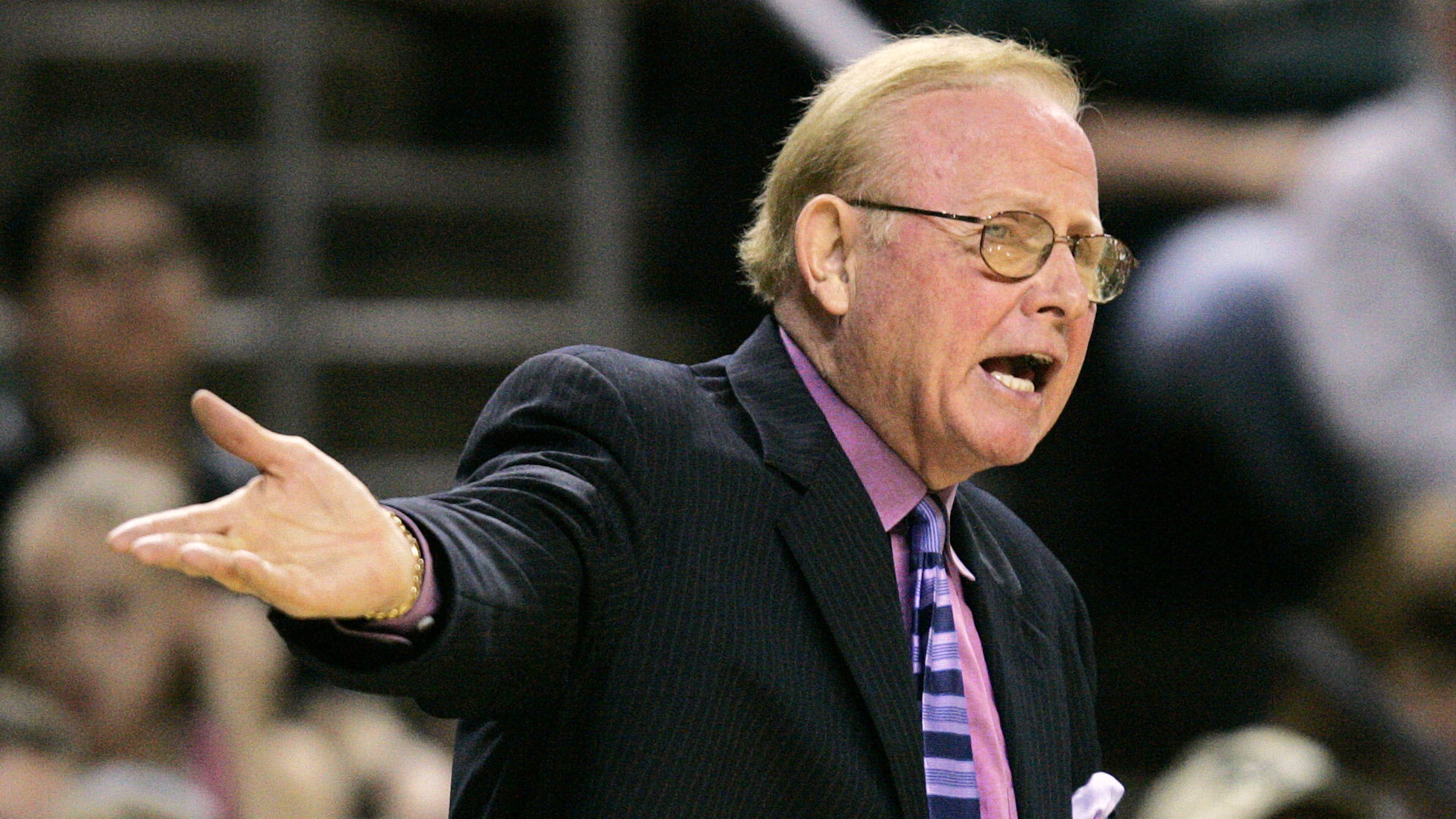FILE - Washington Mystics coach Richie Adubato directs his team against the Seattle Storm during an WNBA basketball game, Aug. 3, 2006, in Seattle. (AP Photo/Elaine Thompson)