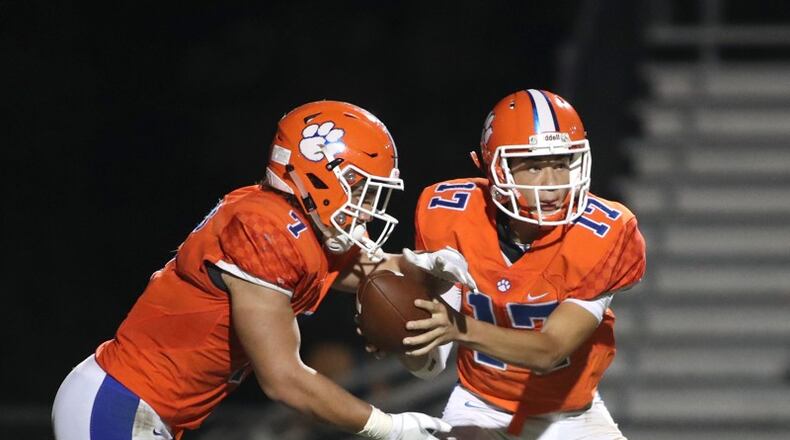 Parkview quarterback Jordan Williams (7) hands off to running back Cody Brown (7) during a 2018 victory over Norcross. They are two of eight all-region players that Parkview will return in 2019.