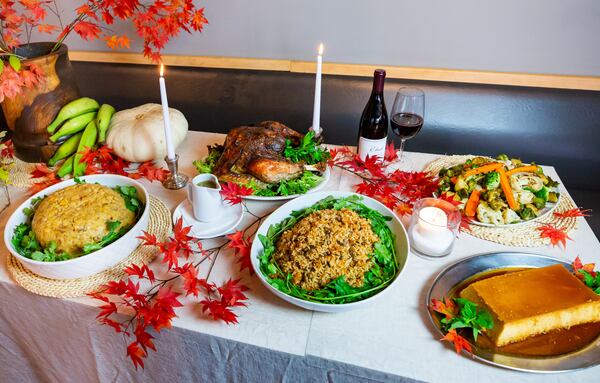 Special Thanksgiving featuring from left: mofongo, roasted turkey, Puerto Rican Rice, seasonal vegetables, and pumpkin flan at Jimmy'Z Kitchen, 2468 Windy Hill Rd SE #600, Marietta, GA 30067. Photo taken Tuesday November 18, 2021 (Ryan Fleisher for The Atlanta Journal-Constitution)