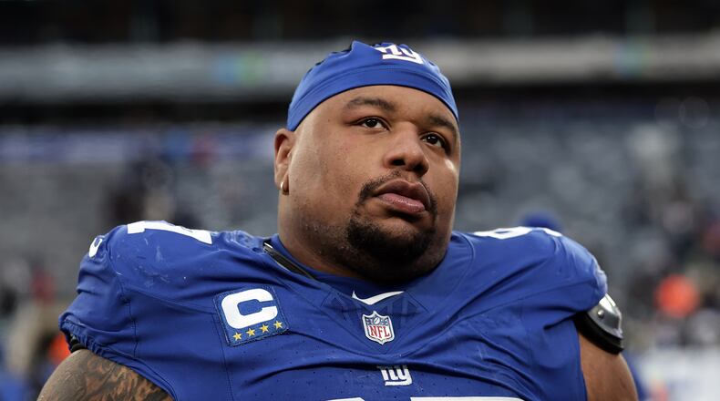 FILE - New York Giants defensive tackle Dexter Lawrence II (97) walks off the field after an NFL football game against the Dallas Cowboys, Sunday, Jan. 4, 2026, in East Rutherford, N.J. (AP Photo/Adam Hunger, File)