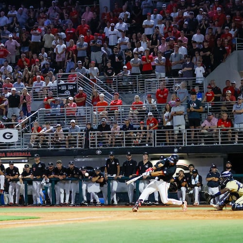 Georgia first baseman Corey Collins hits a two-run RBI double in the 10th inning against Georgia Tech during an NCAA Regional game in Athens in 2024. In a matchup of top 10 teams, the seventh-ranked Bulldogs defeated the third-ranked Yellow Jackets in two straight games to advance to the College World Series. (Miguel Martinez/AJC 2024)