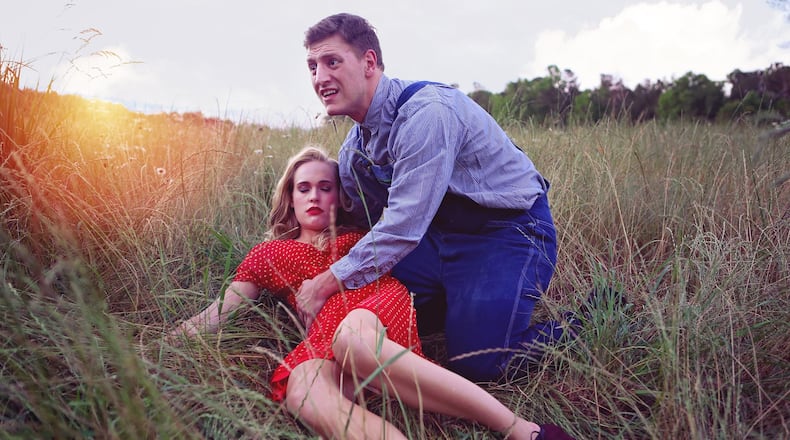 Nicole Carpenter (as Curley’s wife) and Blake Burgess (as Lennie) in John Steinbeck’s “Of Mice and Men” at Serenbe Playhouse. CONTRIBUTED BY BREEANNE CLOWDUS