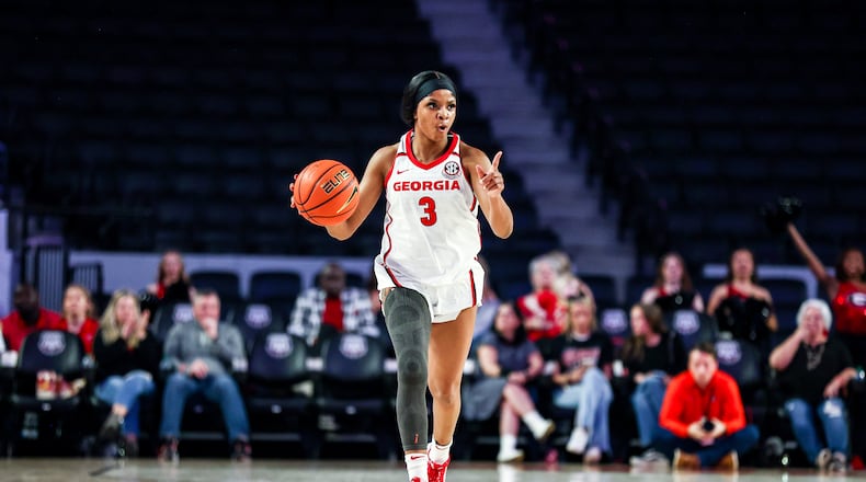 Georgia guard Diamond Battles (3) signals to her teammates during the Bulldogs' game against Auburn at Stegeman Coliseum in Athens on Thursday, Feb. 23, 2023. (Tony Walsh/UGA Athletics)