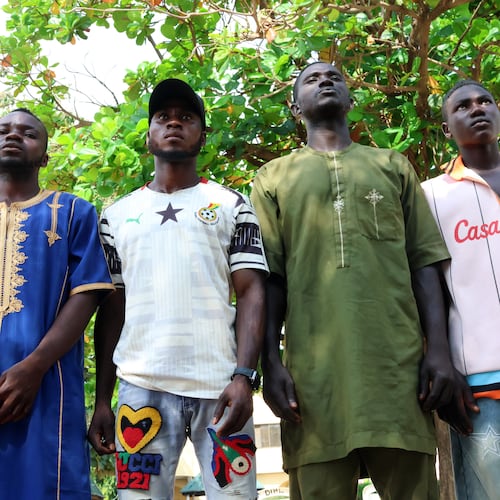 Mubarak Dahiru, second left, and friends who survived while in detention by NSCDC officials are photographed in Minna, Nigeria, Saturday, Sept. 19, 2026. (AP Photo/Afolabi Sotunde)