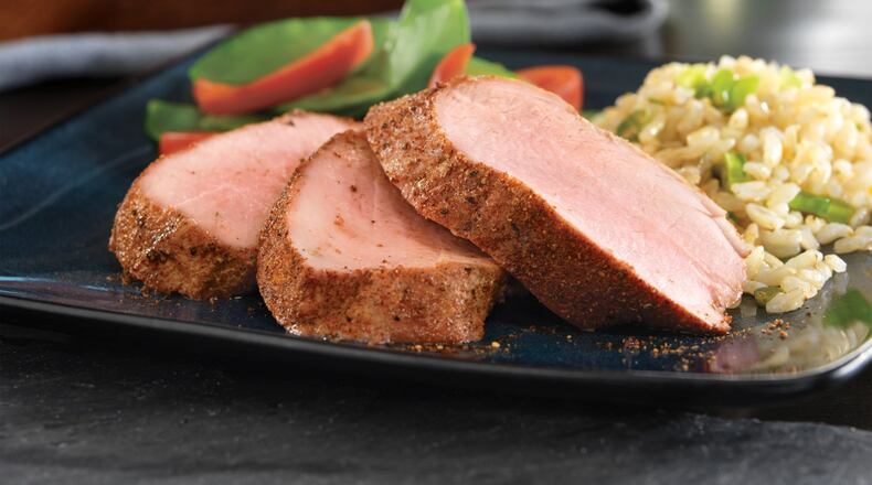 Sunday’s Pork Tenderloin With Asian Dry Rub is served with brown rice. CREDIT: National Pork Board, PorkBeInspired.com