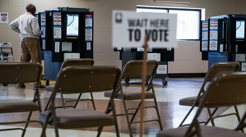 A voter casts a primary ballot on March 12 in Atlanta. (Elijah Nouvelage/AFP/Getty Images/TNS)