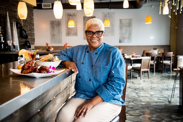 Twisted Soul chef/owner Deborah VanTrece prepares Sweet Tea Ribs, Southern Mediterranean Salad and Moonshine Flight. (Mia Yakel)