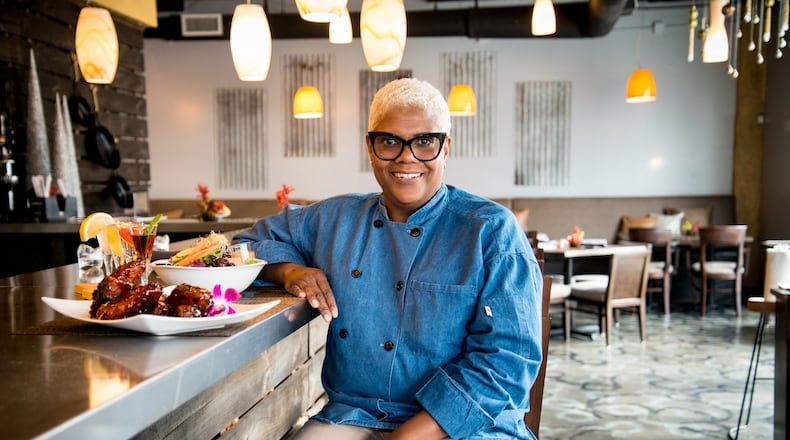 Twisted Soul chef/owner Deborah VanTrece prepares Sweet Tea Ribs, Southern Mediterranean Salad and Moonshine Flight. (Mia Yakel)