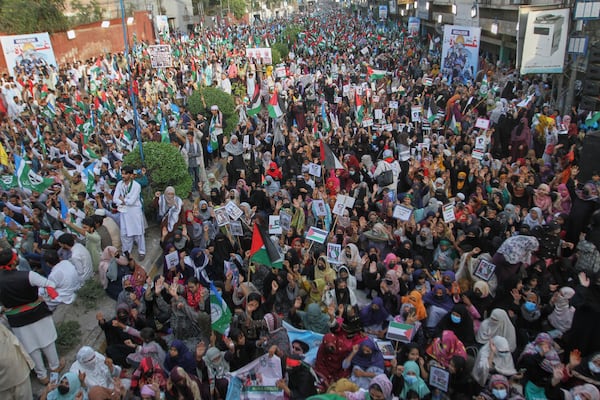 Supporters of the Pakistani religious group "Jamaat-e-Islami" take part in a rally against Israeli airstrikes and to show solidarity with Palestinian people living in Gaza, in Multan, Pakistan Friday, April 18, 2025. (AP Photo/Asim Tanveer)