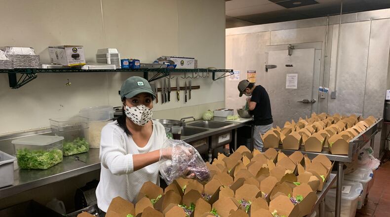 The kitchen at Tuk Tuk Thai Food Loft preparing orders for Feed the Frontline. COURTESY OF TAMARIND RESTAURANT GROUP