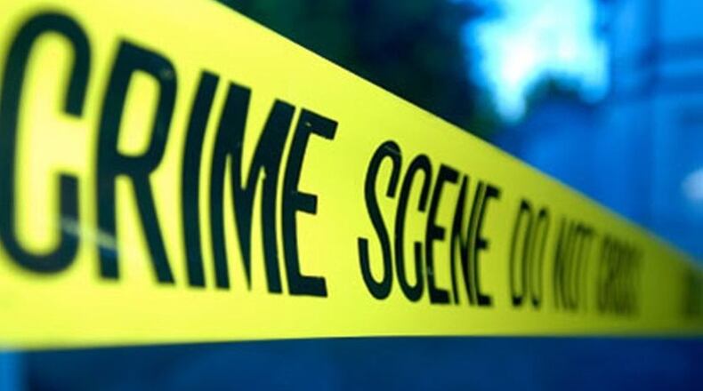 Cobb County police say a man was shot and killed July 4 while strangling his father.