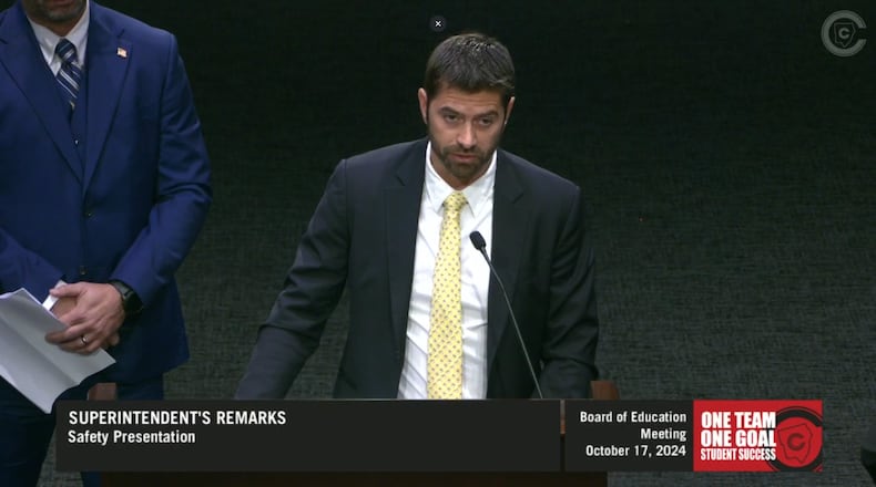 A school safety contractor who identified himself only as Rob appeared before the Cobb County school board this month, saying his team was working with the schools to detect safety threats before they occurred. The district initially did not make public the company's name, but later confirmed the company is Servius Group after the AJC identified the speaker as Rob Sarver, its CEO. (Courtesy)
