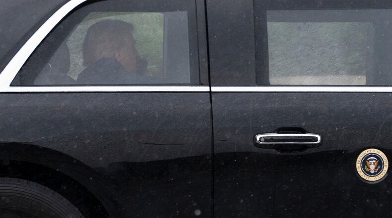 President Donald Trump sits at the back of the presidential limousine as it drives outside the Walter Reed National Military Medical Center from the White House, Tuesday, May 15, 2026 in Bethesda, Md. (AP Photo/Manuel Balce Ceneta)