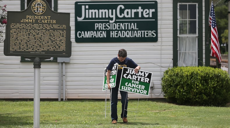 Residents of Plains, Ga., posted hundreds of campaign-like signs in support of their most famous citizen.