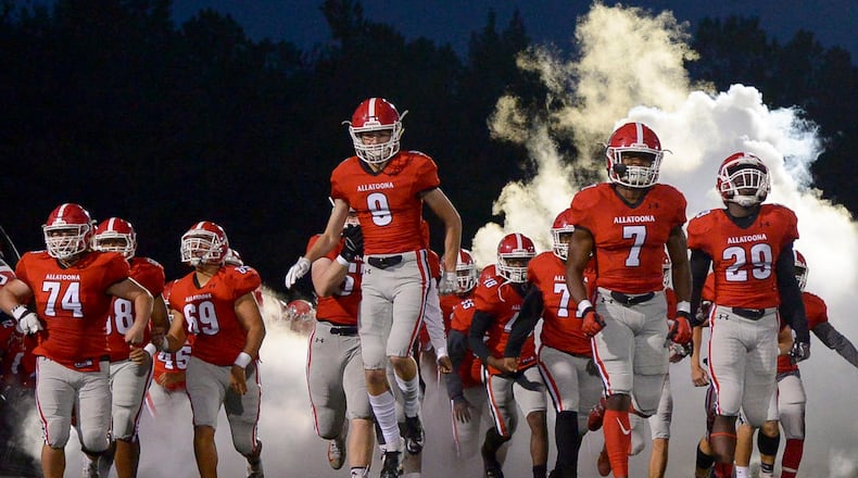 The Allatoona Buccaneers take the field before the start of  their game against Hapeville Charter Friday, October 12, 2018 at Allatoona High School. PHOTO/Daniel Varnado