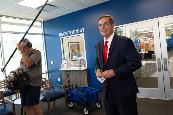 Georgia Secretary of State and gubernatorial hopeful Brad Raffensperger talks to journalists after visiting the Fulton County elections on Tuesday. (Ben Gray for the AJC)