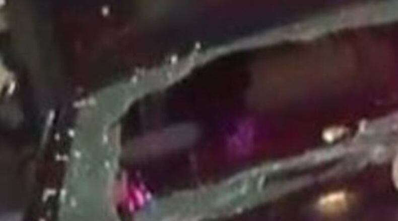 A rear window of an Uber vehicle was damaged by gunshots in Athens, police said.