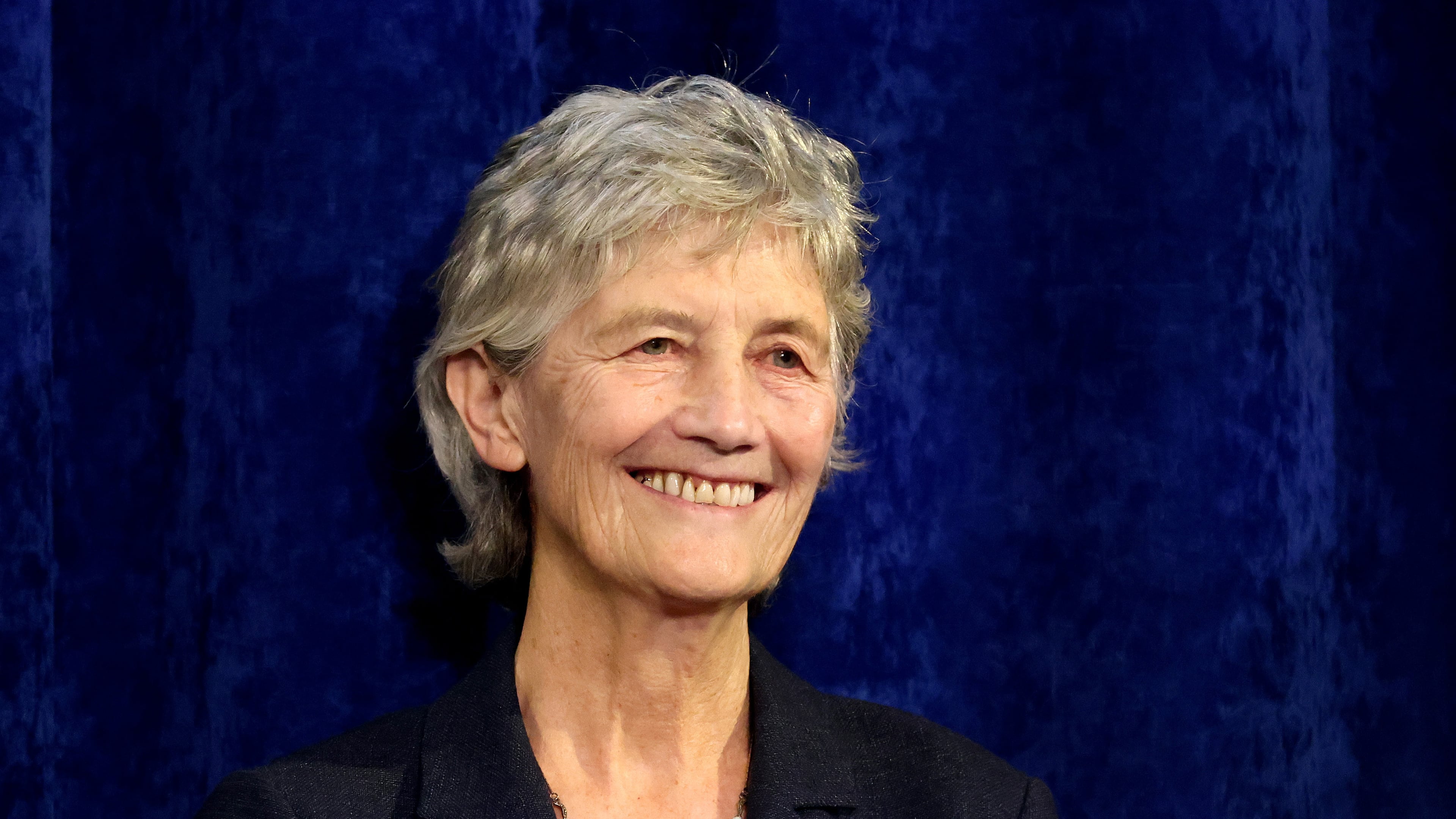 Catherine Connolly smiles to supporters after being elected as the new President of Ireland at Dublin Castle, Ireland, Saturday, Oct. 25, 2025. (AP Photo/Peter Morrison)