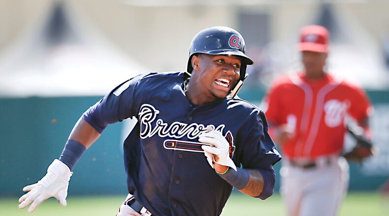 Braves prospect Ronald Acuna was the only player among the majors’ top 40 in OPS to have more than three stolen bases before Thursday. (AP photo)