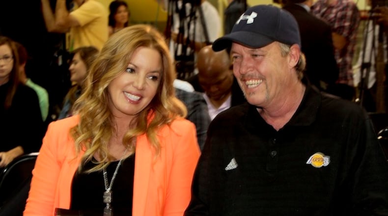 Jeanie and Jim Buss talk before the start of a news conference at the Toyota Sports Center in El Segundo, Calif., on August 10, 2012. (Anne Cusack/Los Angeles Times/TNS)