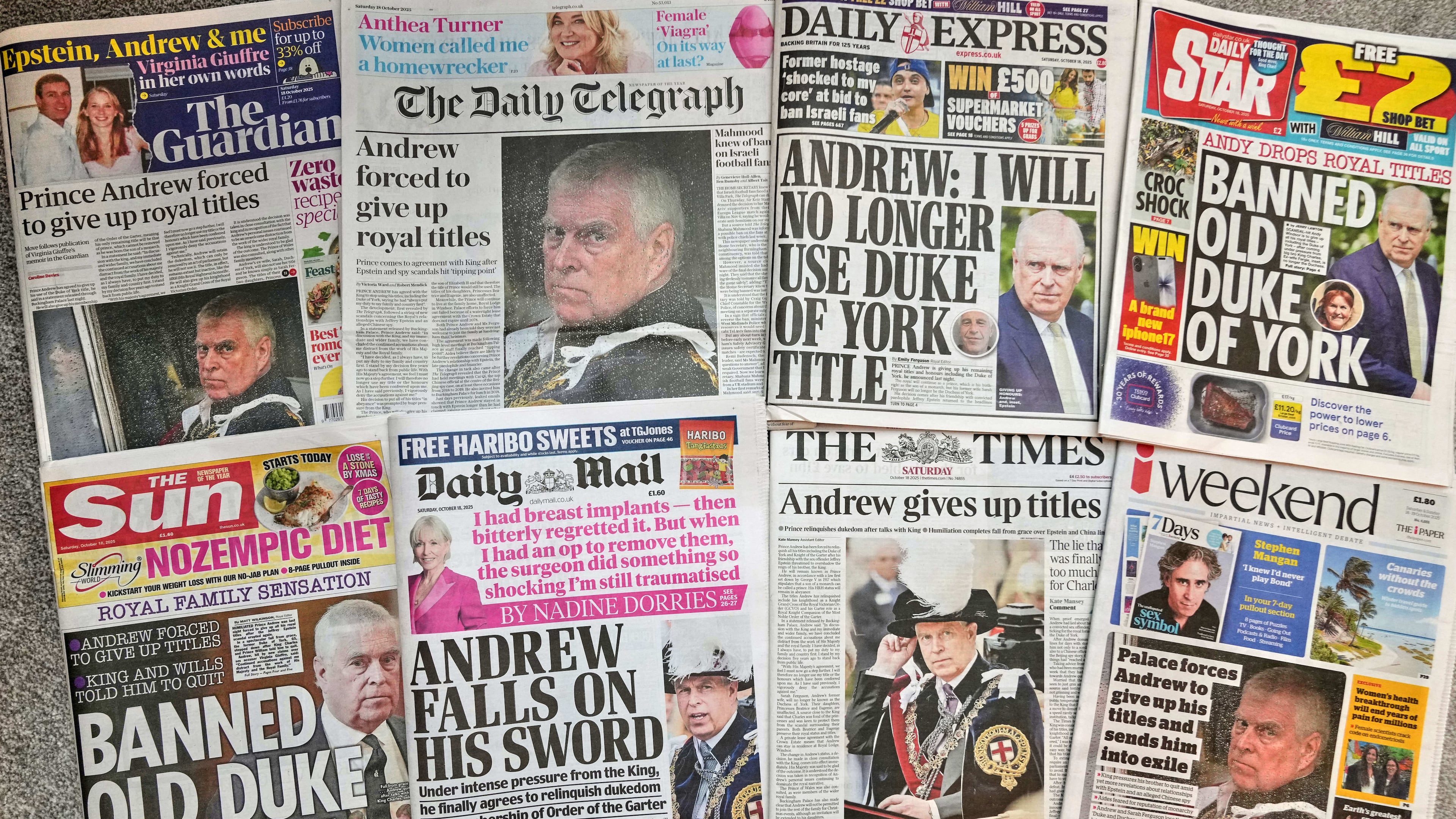 A selection of British national newspapers showing the front pages and their reaction to Prince Andrew announcing that he will relinquish his Duke of York title and the Order of the Garter, amid ongoing problems in his personal life, in London, Saturday, Oct. 18, 2025. (AP Photo/Alastair Grant)