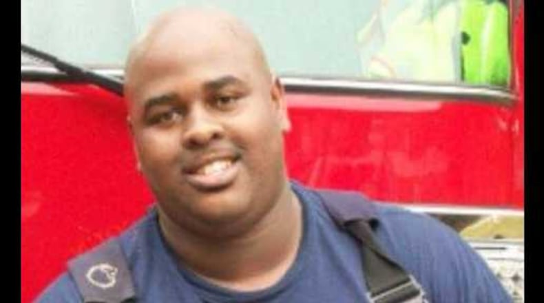 Robert Sutton, a DeKalb County firefighter, caught a baby dropped from a burning building.