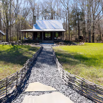 The Ember cabin is one of four cottage-style suites at Quercus, a Luxury Ranch in Meriwether County, seen on Thursday, March 12, 2026. Quercus in Gay, Georgia, was awarded the Best New Hotel Design 2026 by Tablet Hotels, praised for its distinctive blend of regenerative farming and 3,800 acres of forest and pasture. (Miguel Martinez/AJC)