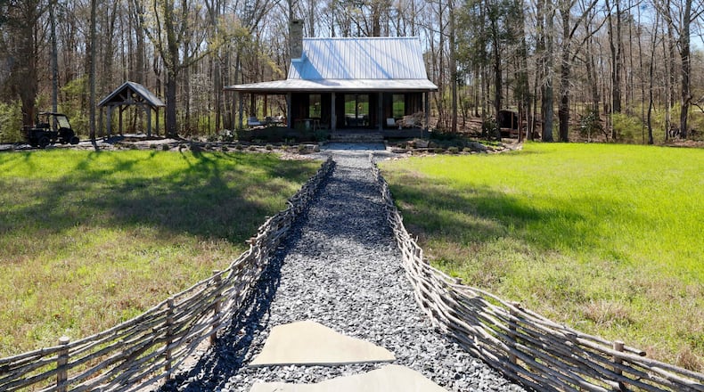 The Ember cabin is one of four cottage-style suites at Quercus, a Luxury Ranch in Meriwether County, seen on Thursday, March 12, 2026. Quercus in Gay, Georgia, was awarded the Best New Hotel Design 2026 by Tablet Hotels, praised for its distinctive blend of regenerative farming and 3,800 acres of forest and pasture. (Miguel Martinez/AJC)