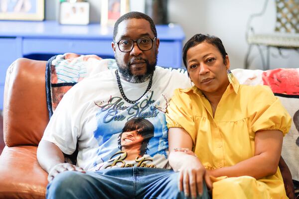 “We feel like we lost a kid so senselessly. As time goes by, the loss feels bigger," says Terrica Thomas, seen here with husband Ramonne. (Miguel Martinez/AJC)