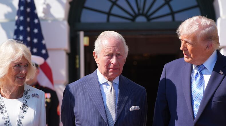 President Donald Trump and first lady Melania Trump greet Britain's King Charles III and Queen Camilla as they arrive at the White House, Monday, April 27, 2026, in Washington. (AP Photo/Alex Brandon)