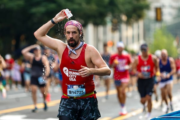 Don't let the calendar fool you. Fall temperatures haven't arrived yet, so experts say to take it slow and stay hydrated. (AJC)