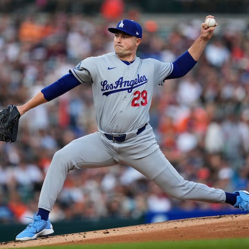 Los Angeles Dodgers pitcher Tarik Skubal throws against the Detroit Tigers during the first inning of a baseball game Friday, Aug. 28, 2026, in Detroit. (AP Photo/Paul Sancya)