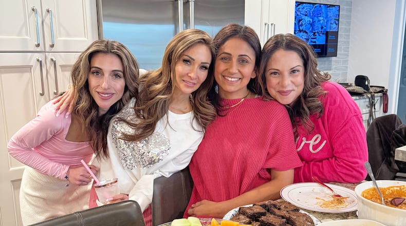Anastasia Richman, from left, Chela Papaccioli, Nova Brown and Maria Suppa pose at a Galentine's Day party hosted by Papaccioli in Franklin Lakes, N.J. on Feb. 16, 2025. (Joyce Shmaruk via AP)