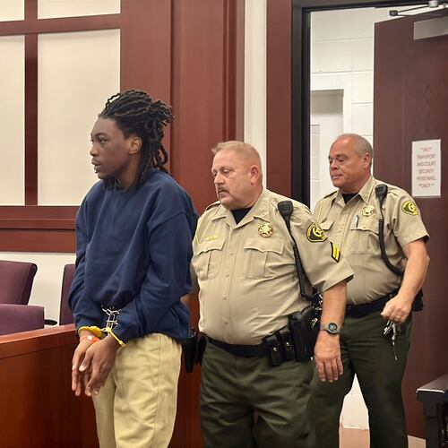 Denzelle D. Willis Jr., 14, entering Houston County Superior Court on Thursday, where he was arraigned on aggravated assault and other charges in connection with the shooting and wounding of a fellow Warner Robins High School student on Wednesday. (Joe Kovac Jr./AJC)