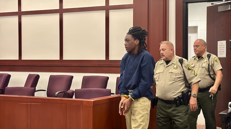 Denzelle D. Willis Jr., 14, entering Houston County Superior Court on Thursday, where he was arraigned on aggravated assault and other charges in connection with the shooting and wounding of a fellow Warner Robins High School student on Wednesday. (Joe Kovac Jr./AJC)