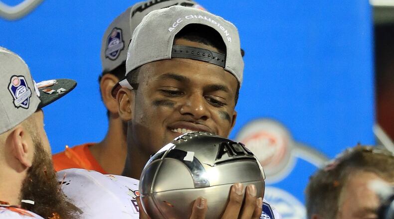 Deshaun Watson celebrates a championship — not THE championship, but an ACC title won against Virginia Tech. (Mike Ehrmann/Getty Images)