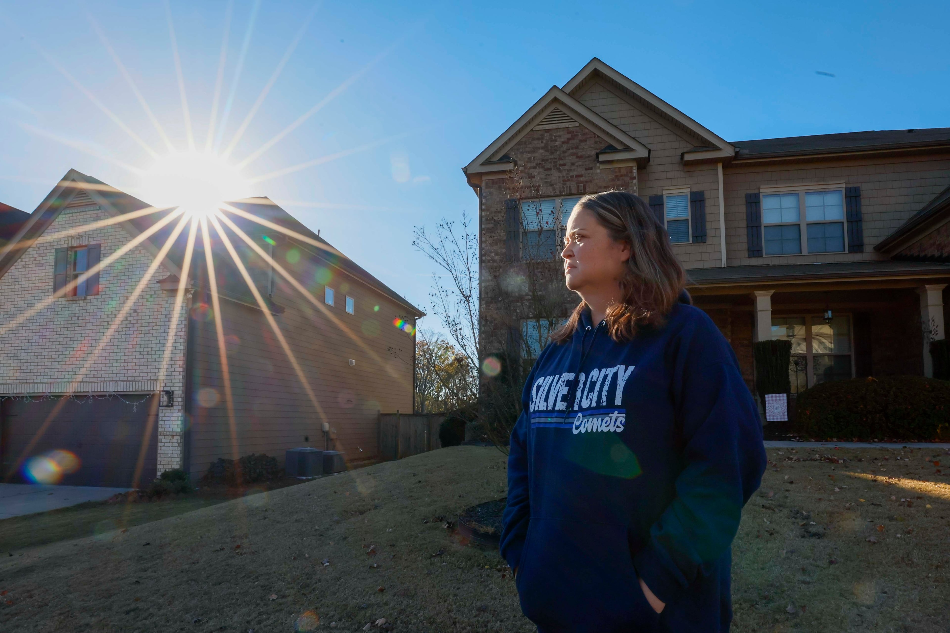 Angela Cassandra at her Cumming home in November. (Miguel Martinez/AJC)