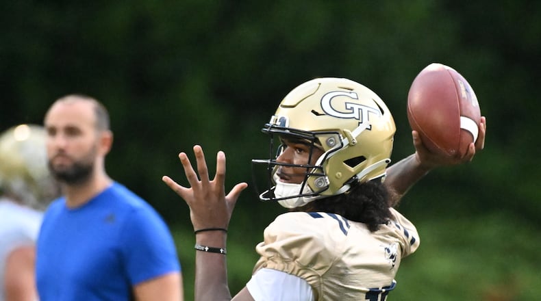 August 5, 2022 Atlanta - Georgia Tech's quarterback Taisun Phommachanh (17) throws a ball during the first football practice of the season at Rose Bowl Field on Georgia Tech Campus in Atlanta on Friday, August 5, 2022. (Hyosub Shin / Hyosub.Shin@ajc.com)