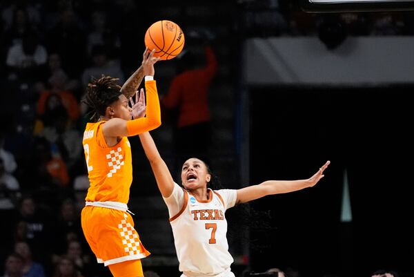 Tennessee guard Ruby Whitehorn (2) shoots against Texas guard Jordan Lee (7) during the first half in the Sweet 16 of the NCAA college basketball tournament, Saturday, March 29, 2025. in Birmingham, Ala. (AP Photo/Gerald Herbert)