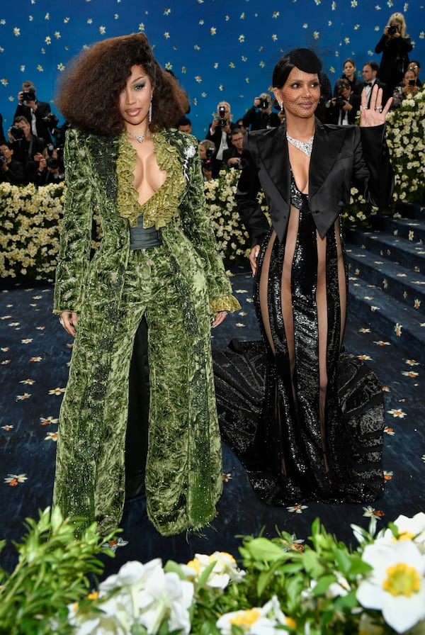 Cardi B, left and Halle Berry attend The Metropolitan Museum of Art's Costume Institute benefit gala celebrating the opening of the "Superfine: Tailoring Black Style" exhibition on Monday, May 5, 2025, in New York. (Photo by Evan Agostini/Invision/AP)